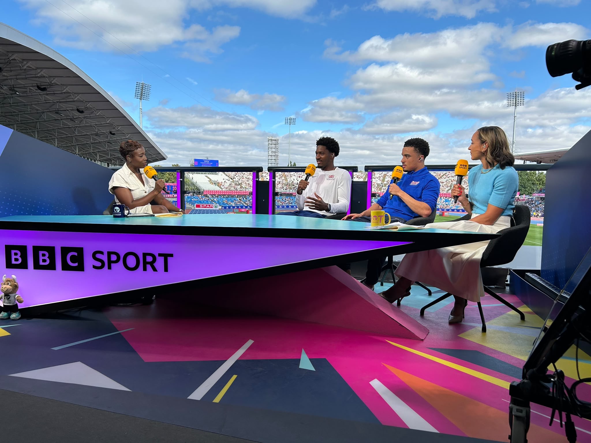Ebuka Nwokeji being interviewed on the BBC Sport punditry desk at the 2026 European Championships